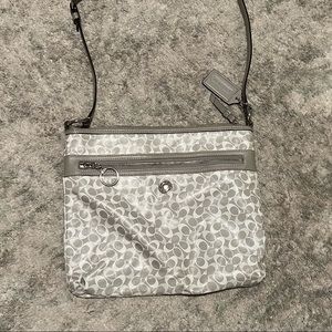 Grey and white coach crossbody bag